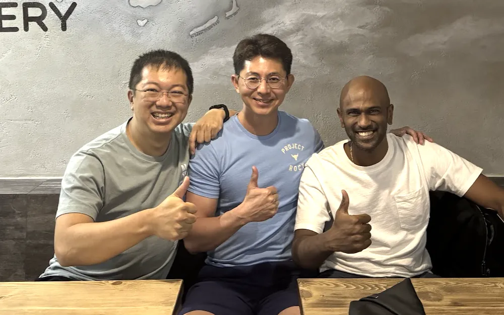 John Huo, KC Lau and Kevin giving thumbs up
